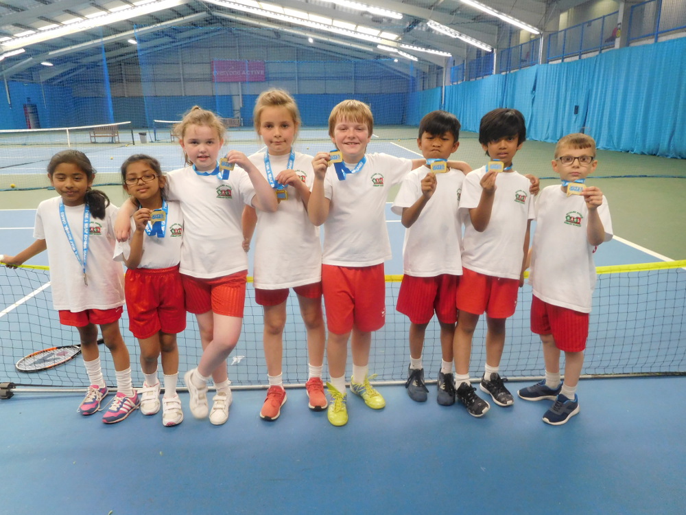 Year 3 with their gold medals for Tennis