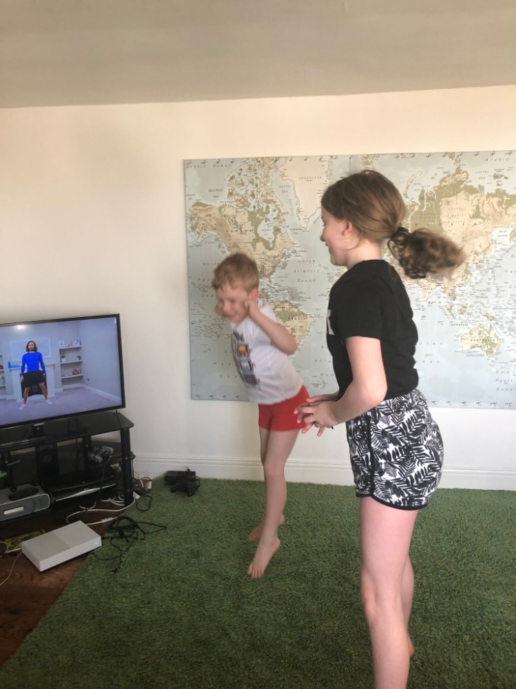 children exercising at home